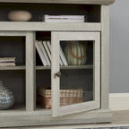 Meuble TV gris pierre 60 avec gestion des câbles, portes en verre et étagères réglables pour téléviseurs jusqu'à 65